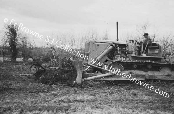 BULLDOZER  CLEARING SCRUB AND TREES